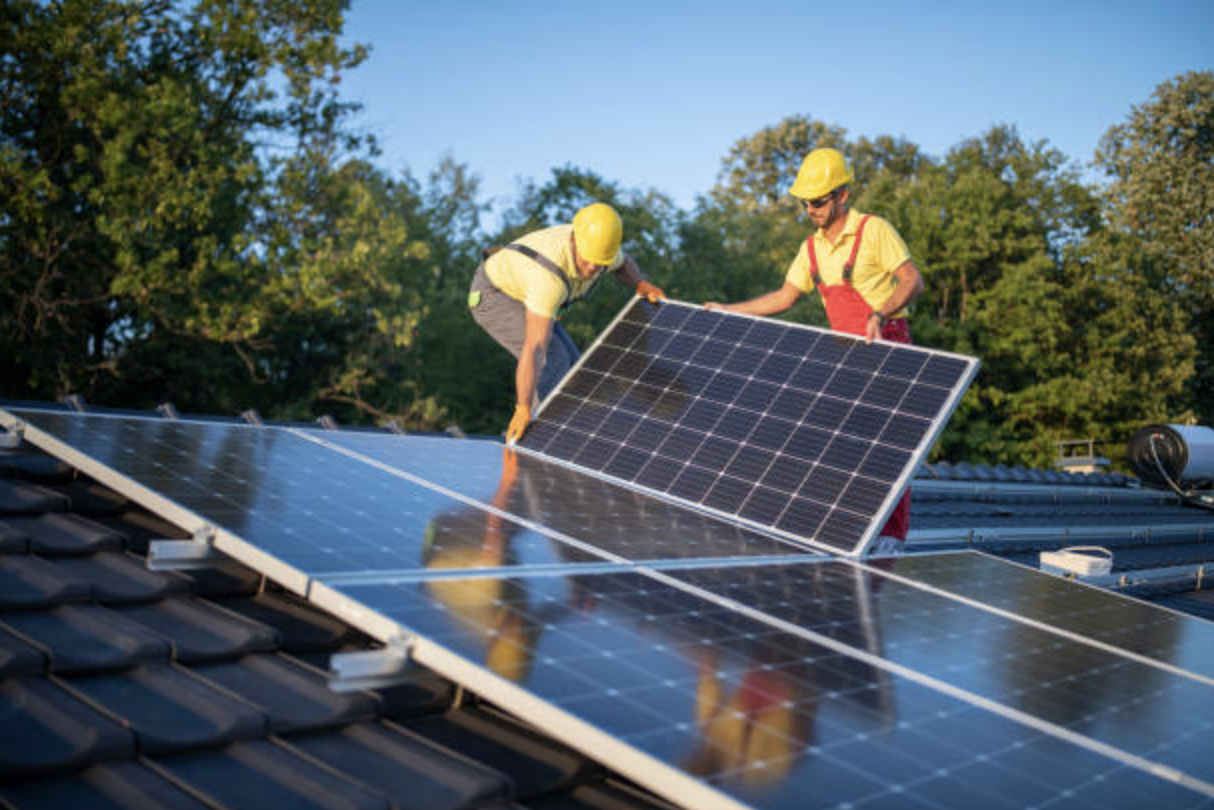 human-installing-solar-panels